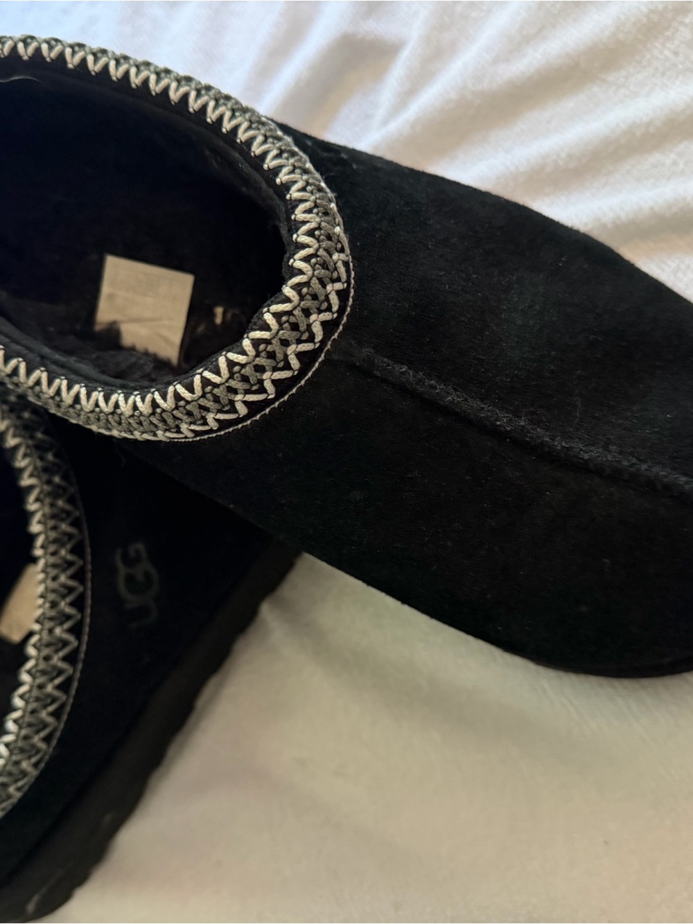 UGG Black Suede Moccasin Slippers with Silver Braided Trim